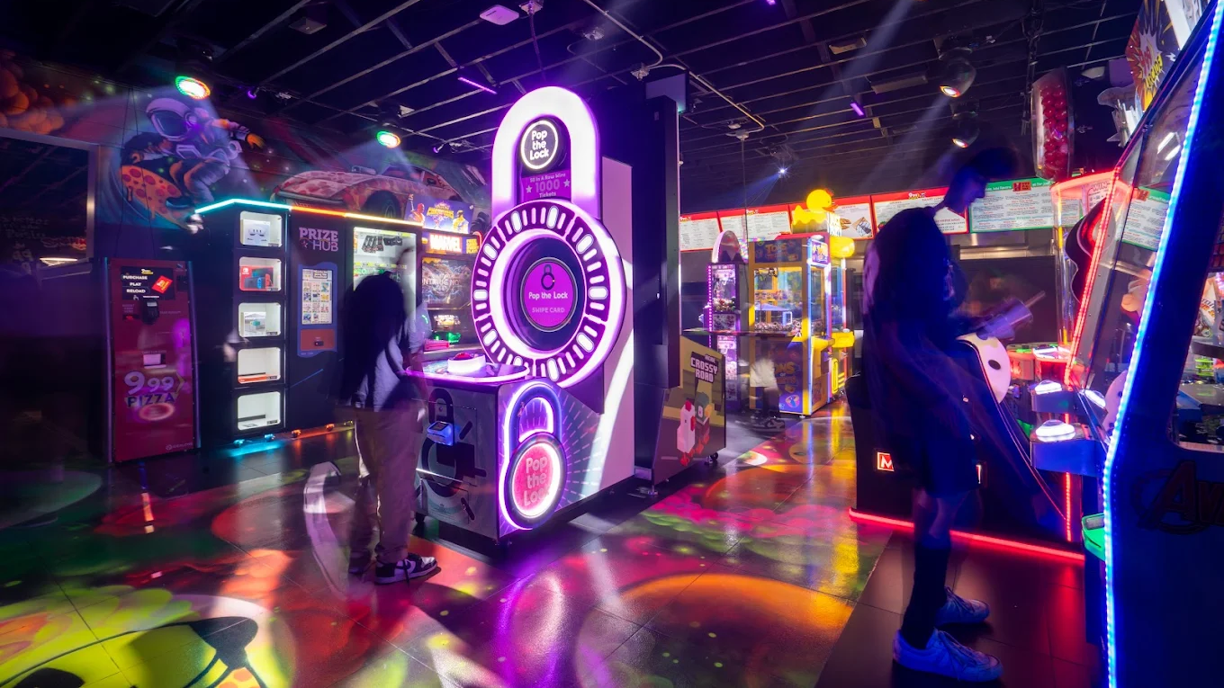 Arcade games and neon lighting at 999 Pizza, Camarillo