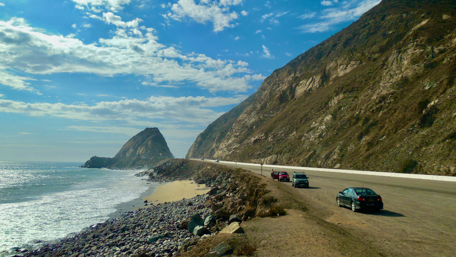 Sunset view of Pacific Coast Highway with the ocean
